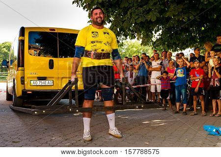 Uzhgorod Ukraine - August 28 2016: Strongmen perform exercise during the 13th power tournament 