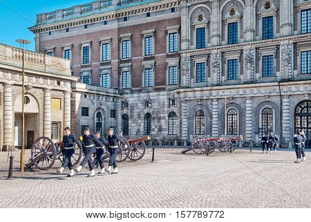 STOCKHOLM, SWEDEN - APRIL 14, 2010: Changing of the Guards at Royal Palace. The Royal Guards has been stationed at the Royal Palace since 1523 and is a popular tourist attraction