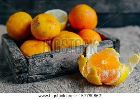 Fresh Mandarin Oranges Fruit With Leaves On Wooden Table.  Ripe
