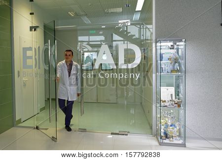 ST. PETERSBURG, RUSSIA - NOVEMBER 16, 2016: Staff go out from the production site of the biotechnology company BIOCAD. It is one of world`s few full-cycle drug development and manufacturing companies