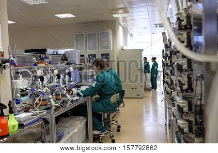 ST. PETERSBURG, RUSSIA - NOVEMBER 16, 2016: Researchers at work in the High-Throughput Biotechnology Laboratory of BIOCAD. It is one of the full-cycle drug development and manufacturing companies
