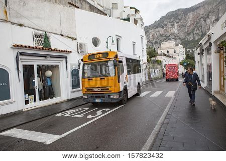 CAPRI ISLAND SOUTH ITALY - NOVEMBER 6 : capri island passenger bus running between capri port to top of island view point by narrow mountain street on november 6 2016 in naple habor italy