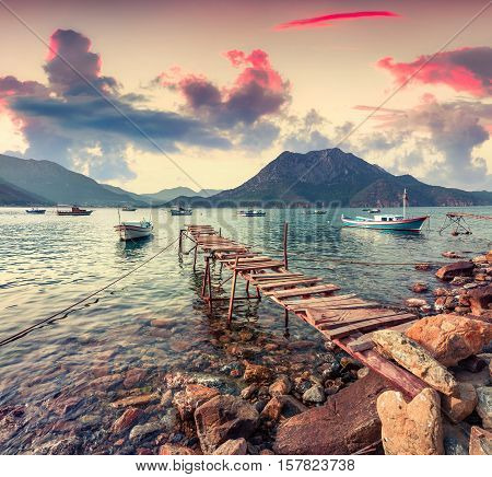 Picturesque Mediterranean Seascape In Turkey. Colorful Spring Sunset In Adrasan Bay With View Of Mos