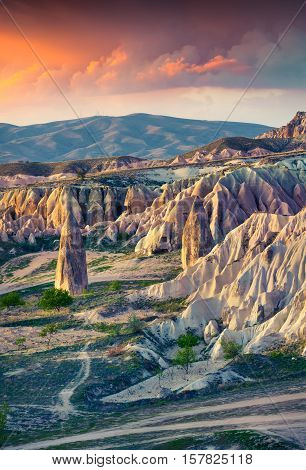 Unreal World Of Cappadocia. Sunrise In Red Rose Valley In April. Chavushin Village Located, District