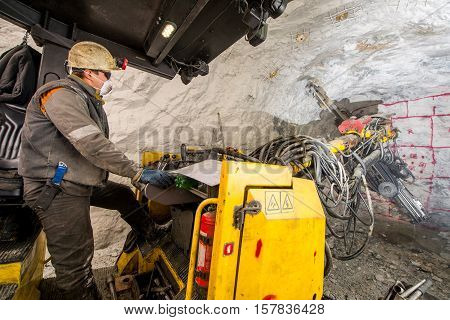 Gold mining underground. Drilling and explosive works.