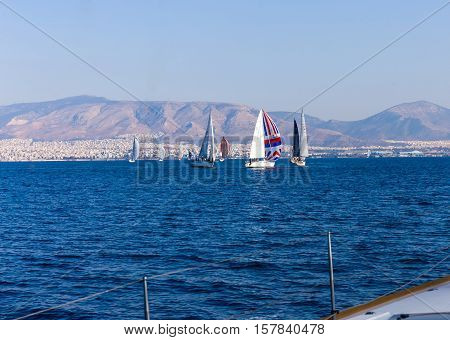 sail vessel surfing through the aegean sea