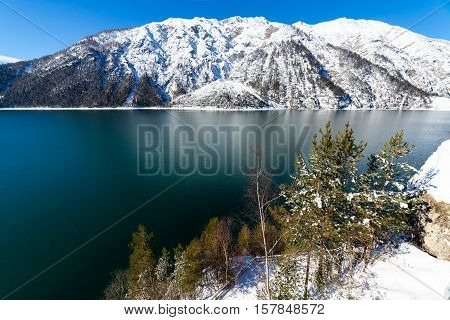 Mountain lake snow landscape in the Alps Austria Achensee Tirol.