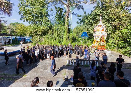 CHIANG RAI THAILAND - NOVEMBER 19 : unidentified people going to the crematory for saying good bye to the dead man in the coffin on November 19 2016 in Chiang rai Thailand