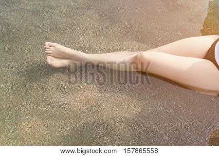 Woman In Bikini Sit At Sea