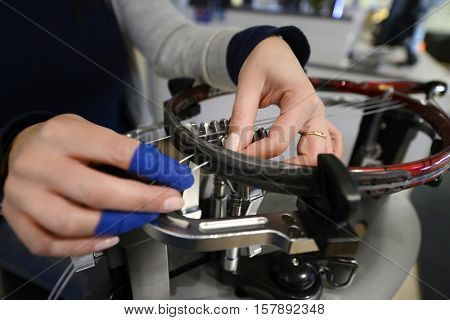 Detail of tennis racket in the stringing machine