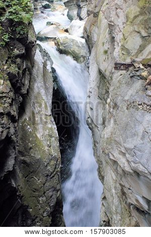 Water torrents through Stanghe, a crevice in Racines near Bolzano in northern Italy