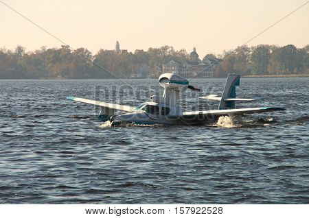 A Seaplane is just beggining to get into its take off run at a Festival in BridgetonNorthCarolina
