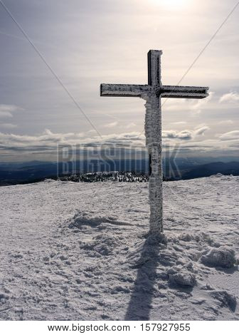 Cross on peak Pilsko, Slovakia in winter    