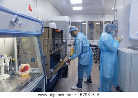 ST. PETERSBURG, RUSSIA - NOVEMBER 16, 2016: Researchers at work in the research laboratory of the biotechnology company BIOCAD. It is one of the full-cycle drug development and manufacturing companies
