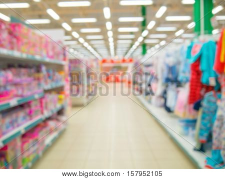 Abstrackt blurred of kids wear and toys of departament store background with bokhe