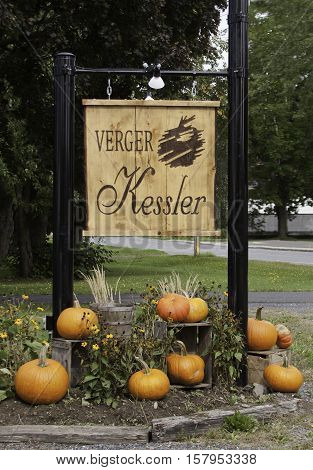 Farnham, QC, September 19, 2016 -- Sign for specialty fruit and vegetable store near rural Farnham, Quebec, on a very bright but slightly overcast day in late September.