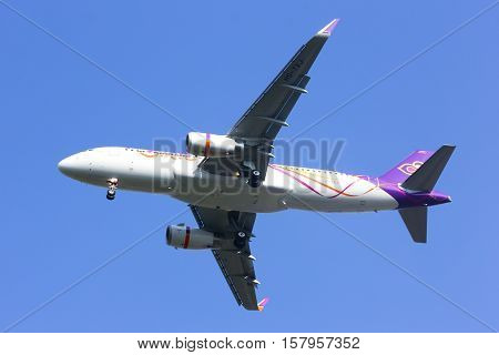 CHIANGMAI , THAILAND- FEBRUARY 19 2014 : HS-TXJ Airbus A320-200 with winglet of Thaismile airway. Landing to Chiangmai airport from Bangkok Suvarnabhumi.