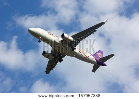 CHIANGMAI , THAILAND- FEBRUARY 19 2014 : HS-TXJ Airbus A320-200 with winglet of Thaismile airway. Landing to Chiangmai airport from Bangkok Suvarnabhumi.