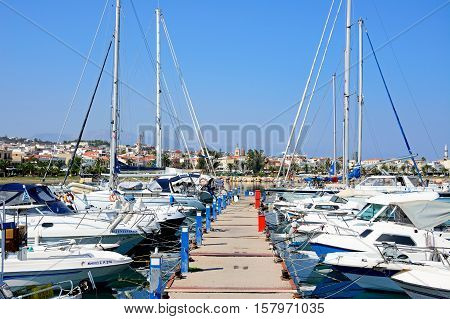 RETHYMNO, CRETE - SEPTEMBER 15, 2016 - Yachts moored in the marina with views of the town to the rear Rethymno Crete Greece Europe, September 15, 2016.