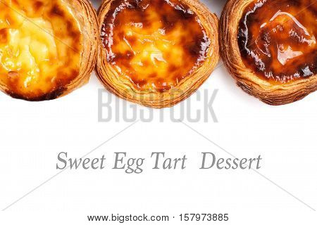 Egg Tarts isolated on white background. Heap of Typical portuguese dessert pasteis de nata close up