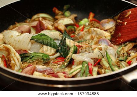 Cooking ,fried Jasmine Rice In Green Curry With Mixed Meat.