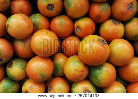 Bunch Of Naranjilla Or Lulo Fruits. Exotic, Tropical And Citrus Food From Northwestern South America