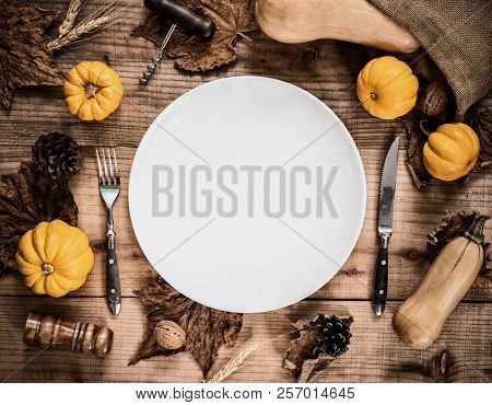 Happy Thanksgiving Day. Without Roasted Chicken And Turkey. Empty White Plate With Pumpkin Decoratio