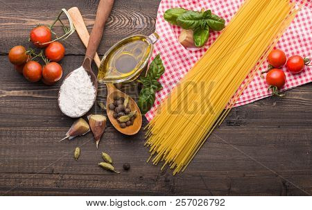 Food Background For Tasty Italian Dishes With Tomato. Various Cooking Ingredients With Spaghetti And