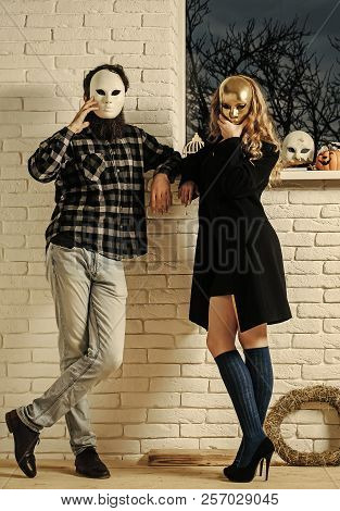 Girl And Man In Mask Stay At Window. Carnival, Masquerade, Masque Party, Holiday Celebration. Decora