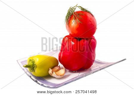 Red Pepper With Tomatoes And Garlic On A Beautiful Plate, For Labels Of Sauces.