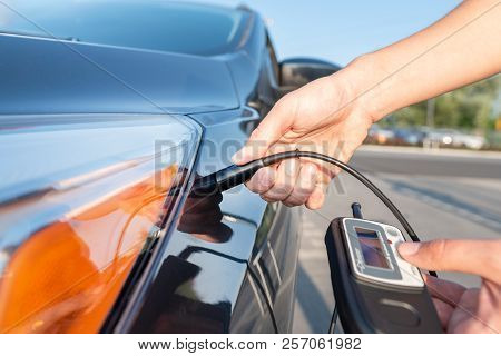Measuring Thickness Of The Car Paint Coating With Paint Thickness Gauge