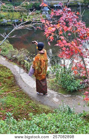 Nara, Japan - November 23, 2016: Tourist Visits Yoshikien Garden Wearing Kimono Costume In Nara, Jap