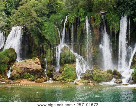 Beautiful Kravica Waterfall In Bosnia And Herzegovina - Popular Swimming And Picnic Area For Tourist