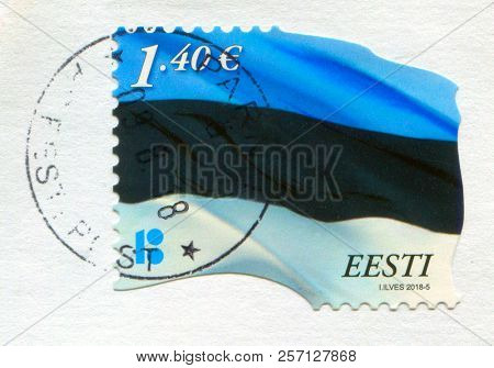 GOMEL, BELARUS, 6 AUGUST 2018, Stamp printed in Estonia shows image of the Flag, circa 2018. 