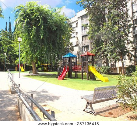 Children's Playground In A Green Garden In The City Of Holon In Israel