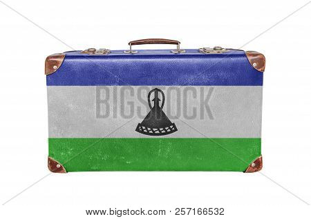 Vintage Suitcase With Lesotho Flag Isolated On White Background