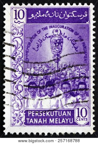Malaya - Circa 1959: A Stamp Printed In Malaya Shows Mace And People, 1st Federal Parliament Of Mala
