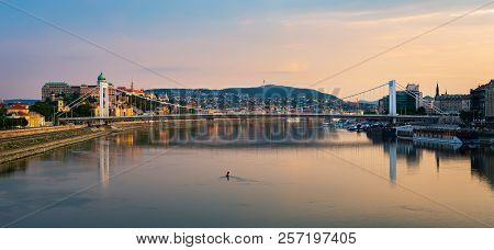 View On Elizabeth Bridge And Budavari Palace On Danube In Budapest At Sunset