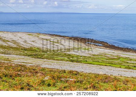Fanore Beach In Burren Mountain With Aran Islands In Background