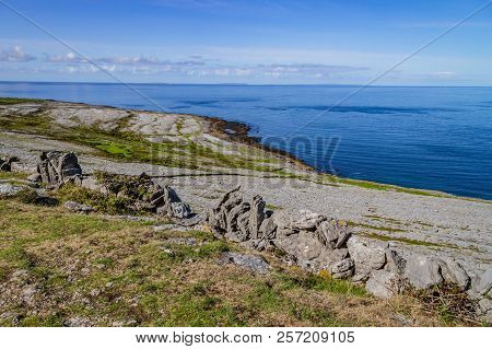 Fanore Beach In Burren Mountain With Aran Islands In Background