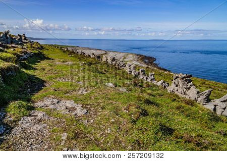Burren Way Trail With Aran Islands In Background
