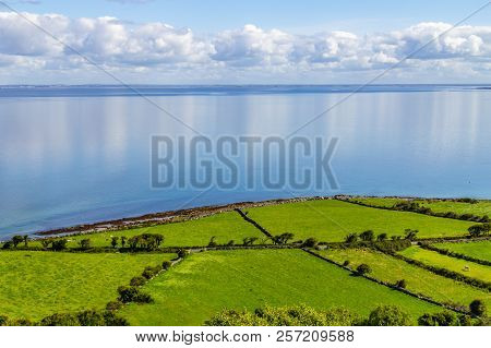 Farms In Burren Way Trail With Galway Bay In Background