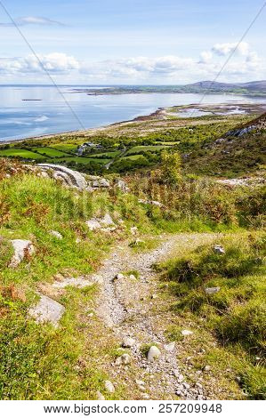 Burren Way Trail With Ballyvaughan Bay In Background