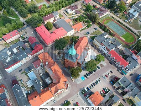 BIALOGARD, POLAND - 17 AUGUST 2018 - Aerial view on Bialogard city center with historical Cathedral.