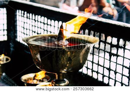 Kathmandu Nepal September 1, 2018 Closeup Of Candles Burning Front A Temple At Durbar Square In Kath