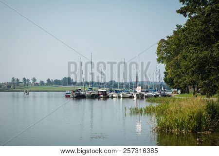 Ryn, Warmia-masuria Province / Poland - July 31, 2018: Marina And Pier On Rynskie Lake, Town Of Ryn.