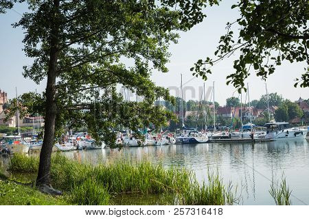 Ryn, Warmia-masuria Province / Poland - July 31, 2018: Marina And Pier On Rynskie Lake, Town Of Ryn.