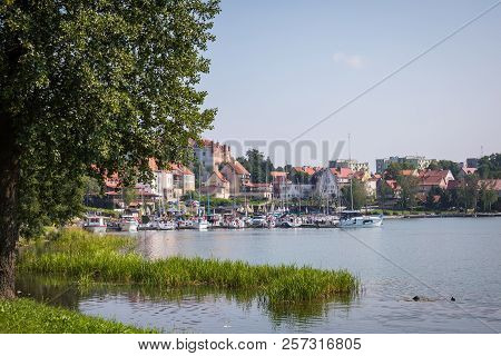 Ryn, Warmia-masuria Province / Poland - July 31, 2018: Marina And Pier On Rynskie Lake, Town Of Ryn.