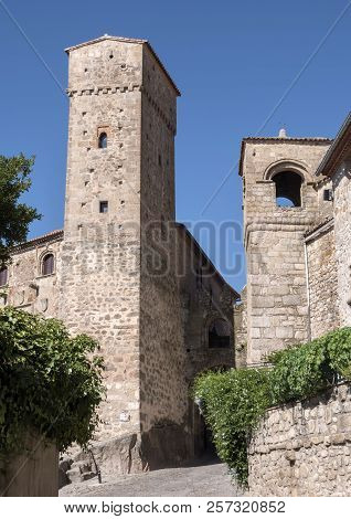 Trujillo, Spain - July 14, 2018: Tower Of The Alcazar Of Luis De Chaves Next To The Slope Of The Blo