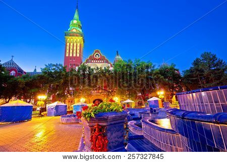 Subotica City Hall And Fountain Square Evening View, Vojvodina Region Of Serbia